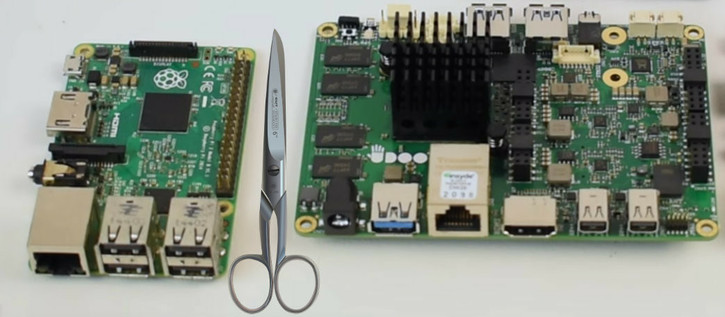 Eine Schere zwischen Raspberry Pi mit ARM Prozessor und Udoo Board mit X86 Prozessor.